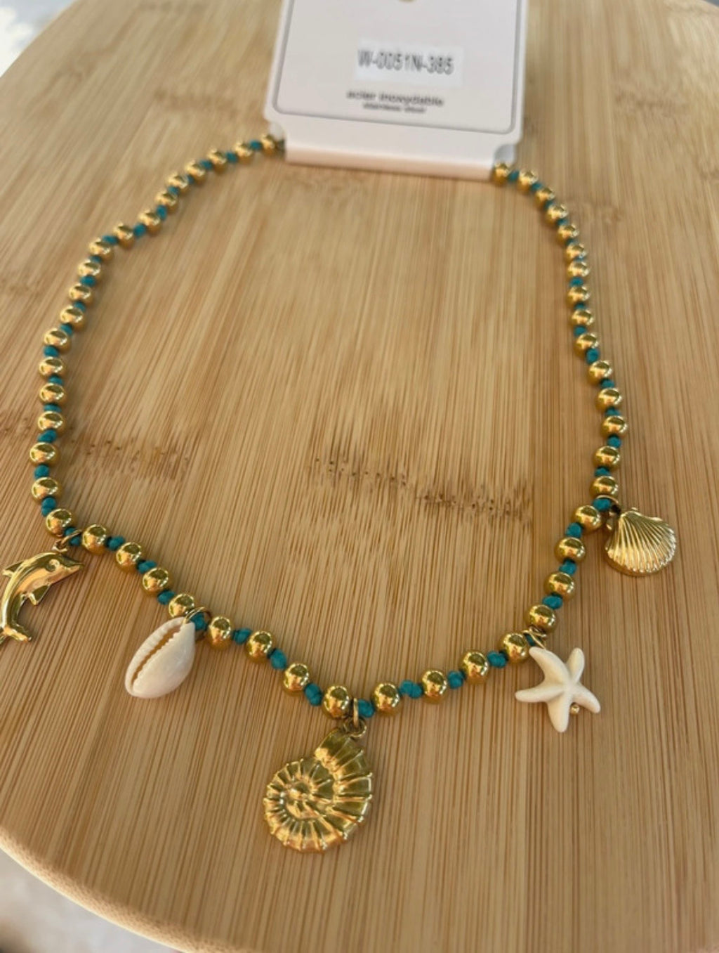 Collier breloque, cordon et charm🐚